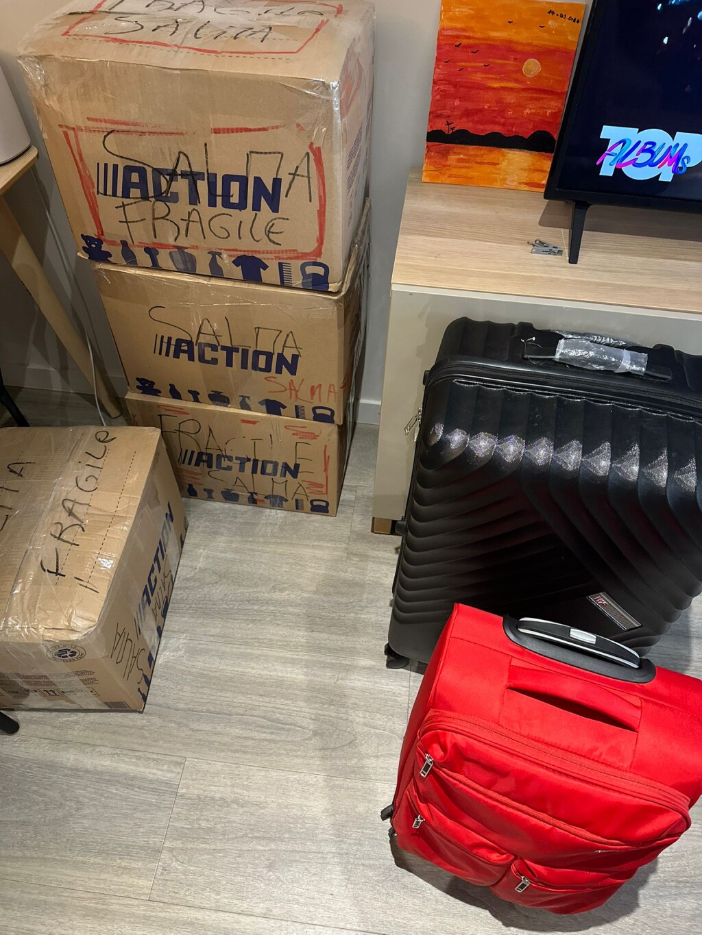 4 boxes and 2 suite cases